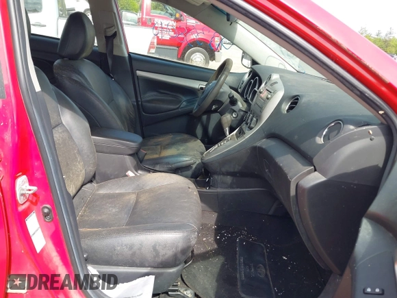 2009 Toyota Matrix S z VIN 2T1LE40EX9C009227, wystawiony jako IAAI lot #42358040 z przebiegiem 182 753 mil mil oraz . Historia ofert i sprzedaży dostępna na DreamBid. Obrazek 5.