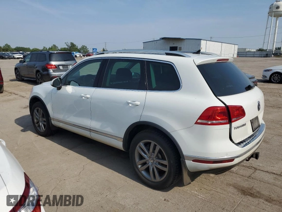2016 Volkswagen Touareg Sport z VIN WVGEP9BPXGD005351, wystawiony jako Copart lot #60719065 z przebiegiem 133 674 mil mil oraz Czysty tytuł • Clean title. Historia ofert i sprzedaży dostępna na DreamBid. Obrazek 2.