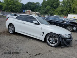 2014 BMW 4 Series 428i xDrive z VIN WBA3T1C56EPS98910, wystawiony jako Copart lot #65903985 z przebiegiem 95 328 mil mil oraz Szkoda całkowita • Salvage title. Historia ofert i sprzedaży dostępna na DreamBid. Obrazek 4.