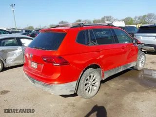 2019 Volkswagen Tiguan S with VIN 3VV1B7AX8KM113120, listed as a IAAI auction lot 41789099 with 124,355 mi miles. Bid and sale history available at carsss.com. Image 4.