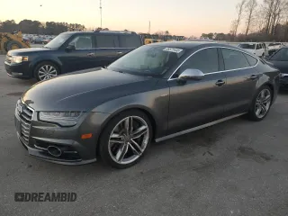 2016 Audi S7 with VIN WAUW2AFC1GN010008, listed as a Copart auction lot 88571445 with 126,480 mi miles and Salvage Title. Bid and sale history available at carsss.com. Image 1.