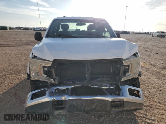 2018 Ford F-150 XL with VIN 1FTFX1E54JKC04497, listed as a Copart auction lot 53398455 with 198,473 mi miles and Salvage title. Bid and sale history available at DreamBid. Image 5.
