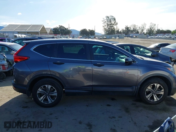 2019 Honda CR-V LX z VIN 2HKRW6H39KH219441, wystawiony jako IAAI lot #41912978 z przebiegiem 99 828 mil mil oraz . Historia ofert i sprzedaży dostępna na DreamBid. Obrazek 13.