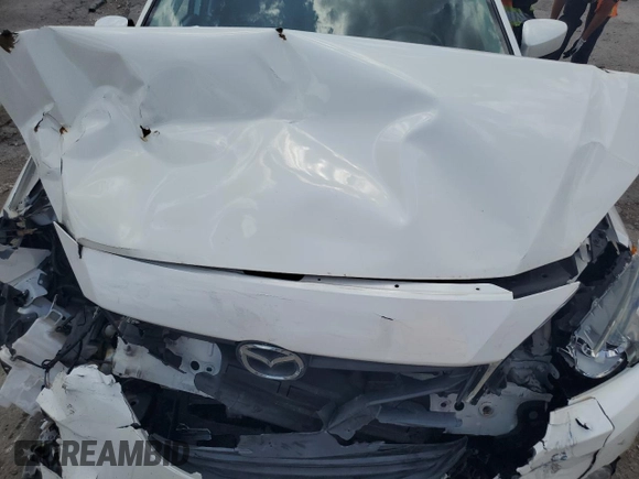 2015 Mazda 3 i Touring with VIN 3MZBM1L7XFM154245, listed as a Copart auction lot 61571995 with Not provided miles and Salvage title. Bid and sale history available at DreamBid. Image 11.
