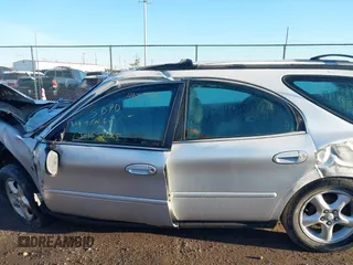 2001 Ford Taurus SE Standard z VIN 1FAFP582X1G268769, wystawiony jako IAAI lot #41837093 z przebiegiem 42 261 mil mil oraz . Historia ofert i sprzedaży dostępna na DreamBid. Obrazek 14.