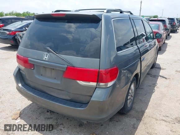 2008 Honda Odyssey EX-L with VIN 5FNRL38768B402507, listed as a IAAI auction lot 42036786 with 235,112 mi miles. Bid and sale history available at carsss.com. Image 4.