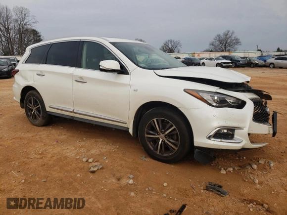 2019 Infiniti QX60 Luxe with VIN 5N1DL0MM7KC526872, listed as a Copart auction lot 43431365 with 123,058 mi miles and Salvage Title. Bid and sale history available at DreamBid. Image 4.