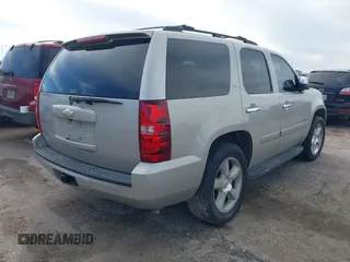 2008 Chevrolet Tahoe LTZ with VIN 1GNFC13JX8R277832, listed as a IAAI auction lot 41348121 with 210,576 mi miles and . Bid and sale history available at DreamBid. Image 4.