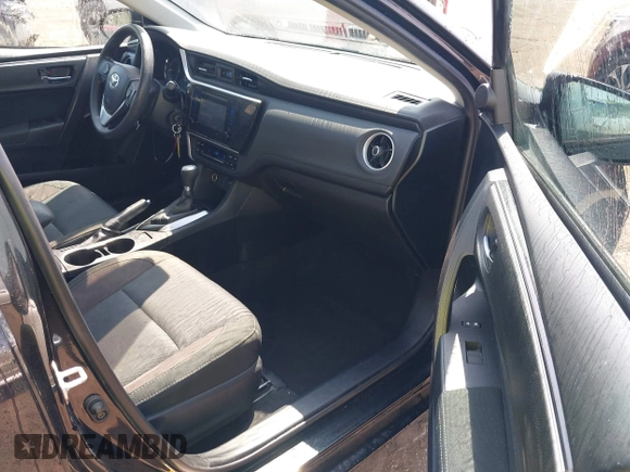 2018 Toyota Corolla L with VIN 2T1BURHE9JC964444, listed as a IAAI auction lot 42524046 with 69,218 mi miles and . Bid and sale history available at DreamBid. Image 5.