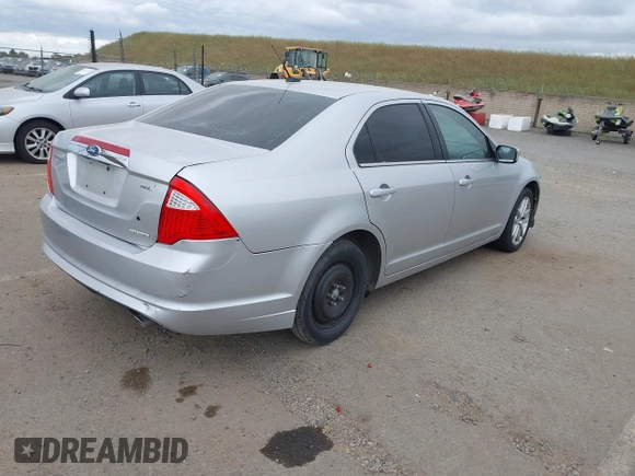 2011 Ford Fusion SEL with VIN 3FAHP0JG3BR330704, listed as a IAAI auction lot 42116994 with 215,020 mi miles. Bid and sale history available at carsss.com. Image 4.