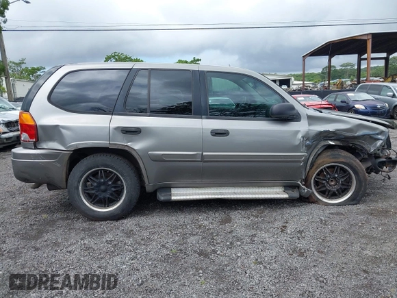 2005 GMC Envoy SLT z VIN 1GKDS13S152161472, wystawiony jako IAAI lot #40110978 z przebiegiem 141 908 mil mil oraz . Historia ofert i sprzedaży dostępna na DreamBid. Obrazek 14.