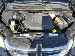 2018 Dodge Grand Caravan SXT with VIN 2C4RDGCG8JR300082, listed as a Copart auction lot 55357765 with 119,444 mi miles and Salvage Title. Bid and sale history available at DreamBid. Image 12.
