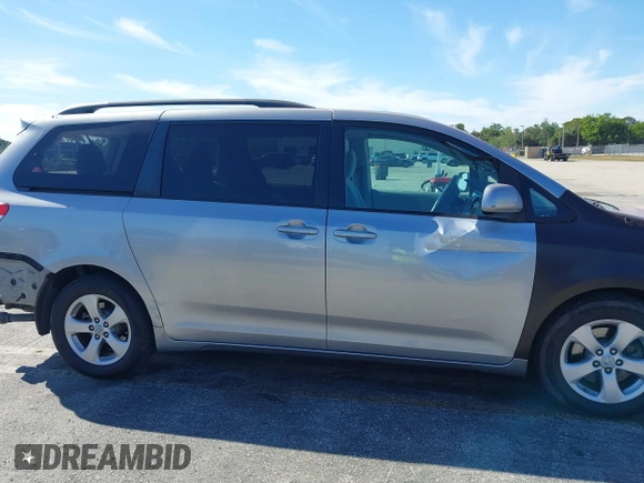 2012 Toyota Sienna LE AAS with VIN 5TDKK3DC6CS189747, listed as a IAAI auction lot 41857367 with 205,376 mi miles and . Bid and sale history available at DreamBid. Image 14.