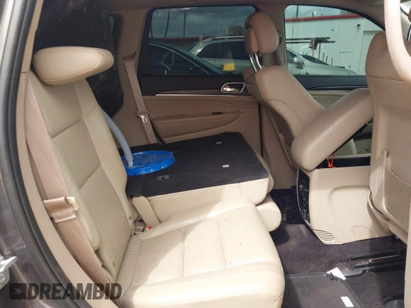 2017 Jeep Grand Cherokee Limited with VIN 1C4RJEBG4HC838019, listed as a IAAI auction lot 41804665 with 135,980 mi miles. Bid and sale history available at carsss.com. Image 8.