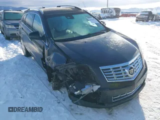 2015 Cadillac SRX Premium Collection with VIN 3GYFNGE38FS593965, listed as a IAAI auction lot 41602374 with 97,949 mi miles. Bid and sale history available at carsss.com. Image 6.