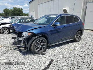 2021 BMW X1 sDrive28i with VIN WBXJG7C06M5S00879, listed as a Copart auction lot 55572445 with 28,252 mi miles and Clean Title. Bid and sale history available at carsss.com. Image 1.