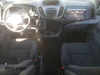 2016 Ford Transit Wagon XL with VIN 1FMZK1YM9GKB28861, listed as a Copart auction lot 77015814 with 111,384 mi miles and Salvage Title. Bid and sale history available at carsss.com. Image 8.