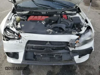 2014 Mitsubishi Lancer Evolution GSR with VIN JA32W8FV2EU019253, listed as a Copart auction lot 86615084 with 104,894 mi miles and Salvage Title. Bid and sale history available at carsss.com. Image 11.