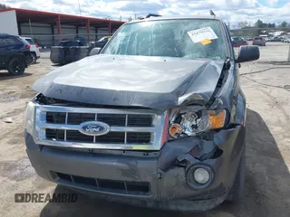2012 Ford Escape XLT with VIN 1FMCU0D76CKC01916, listed as a IAAI auction lot 41879331 with 194,201 mi miles. Bid and sale history available at carsss.com. Image 6.