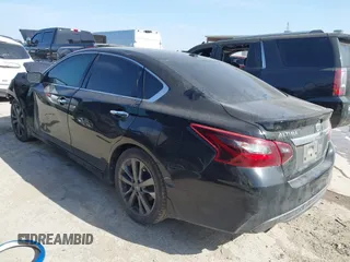 2018 Nissan Altima 2.5 SR with VIN 1N4AL3AP4JC284490, listed as a IAAI auction lot 41795563 with 112,936 mi miles. Bid and sale history available at carsss.com. Image 3.