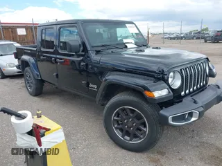 2023 Jeep Gladiator High Altitude z VIN 1C6HJTFG5PL552826, wystawiony jako IAAI lot #42288319 z przebiegiem 55 165 mil mil oraz . Historia ofert i sprzedaży dostępna na DreamBid. Obrazek 1.