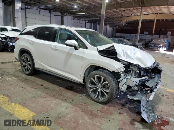 2020 Lexus RX 350L with VIN JTJHZKFA1L2025340, listed as a Copart auction lot 42150215 with 94,304 mi miles and Salvage title. Bid and sale history available at DreamBid. Image 4.