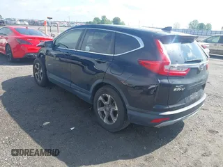 2018 Honda CR-V EX with VIN 7FARW1H59JE001943, listed as a IAAI auction lot 42123180 with 72,451 mi miles and . Bid and sale history available at carsss.com. Image 3.