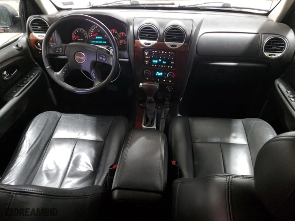 2005 GMC Envoy SLE with VIN 1GKDT13S452315816, listed as a Copart auction lot 52863805 with 128,922 mi miles and Salvage Title. Bid and sale history available at carsss.com. Image 8.