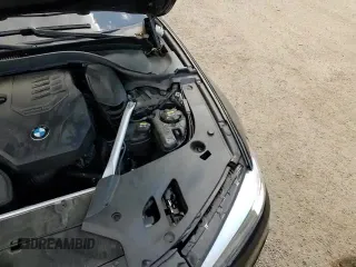 2020 BMW 5 Series 530i xDrive z VIN WBAJR7C00LBP96463, wystawiony jako Copart lot #70451045 z przebiegiem 44 430 mil mil oraz Szkoda całkowita • Salvage title. Historia ofert i sprzedaży dostępna na DreamBid. Obrazek 13.