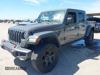 2021 Jeep Gladiator Mojave with VIN 1C6JJTEG8ML515686, listed as a IAAI auction lot 42217590 with 38,506 mi miles and . Bid and sale history available at DreamBid. Image 2.