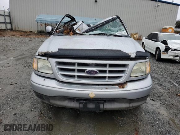 2003 Ford F-150 XL with VIN 1FTRF172X3NB77391, listed as a Copart auction lot 80657174 with Not Provided miles and Salvage Title. Bid and sale history available at DreamBid. Image 5.