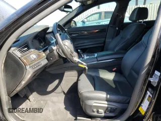 2015 BMW 7 Series 740i с VIN WBAYA6C58FD827009, выставлен на аукционе Copart как лот 50223755 с пробегом 105 440 миль миль и Списание • Salvage title. История ставок и продаж доступна на DreamBid. Изображение 7.