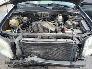2008 Mercury Mariner z VIN 4M2CU81178KJ37731, wystawiony jako Copart lot #55255335 z przebiegiem 195 054 mil mil oraz Szkoda całkowita • Salvage title. Historia ofert i sprzedaży dostępna na DreamBid. Obrazek 11.