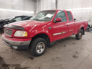 2000 Ford F-150 XL with VIN 1FTRX18L0YNA84231, listed as a IAAI auction lot 41824453 with 223,642 mi miles. Bid and sale history available at carsss.com. Image 2.