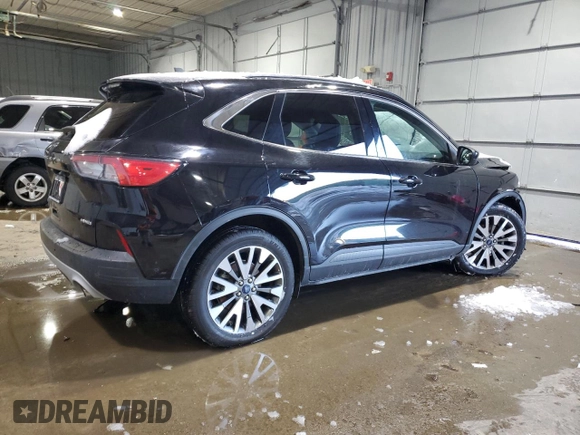 2021 Ford Escape Titanium with VIN 1FMCU9J91MUA57451, listed as a Copart auction lot 44678135 with 74,795 mi miles and Salvage title. Bid and sale history available at DreamBid. Image 3.