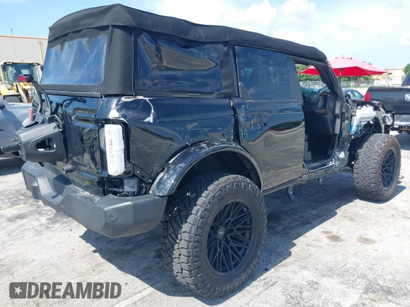 2023 Ford Bronco with VIN 1FMDE5BH3PLA99520, listed as a IAAI auction lot 42684872 with 11,118 mi miles and . Bid and sale history available at DreamBid. Image 4.