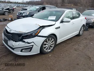 2015 Kia Optima EX with VIN 5XXGN4A73FG438313, listed as a IAAI auction lot 41699954 with 76,584 mi miles. Bid and sale history available at carsss.com. Image 2.