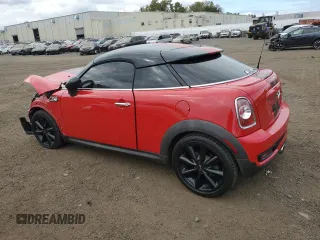 2014 MINI Coupe S z VIN WMWSX3C59ET409176, wystawiony jako Copart lot #72736864 z przebiegiem Nie podano mil oraz Szkody całkowita. Historia ofert i sprzedaży dostępna na DreamBid. Obrazek 2.