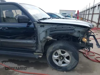 2000 Toyota Land Cruiser z VIN JT3HT05J1Y0081635, wystawiony jako IAAI lot #41938432 z przebiegiem 362 389 mil mil oraz . Historia ofert i sprzedaży dostępna na DreamBid. Obrazek 18.