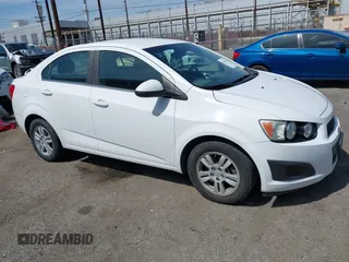 2014 Chevrolet Sonic LT with VIN 1G1JC5SH9E4212898, listed as a IAAI auction lot 41852112 with 121,382 mi miles and . Bid and sale history available at DreamBid. Image 1.