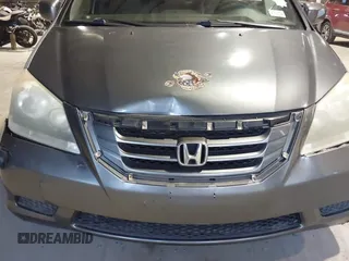 2010 Honda Odyssey EX-L with VIN 5FNRL3H78AB030111, listed as a IAAI auction lot 41250121 with 333,030 mi miles and . Bid and sale history available at DreamBid. Image 14.