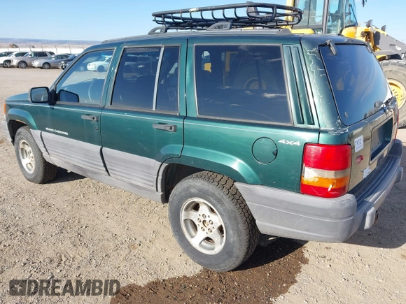 1998 Jeep Grand Cherokee Laredo with VIN 1J4GZ58S5WC362365, listed as a IAAI auction lot 41891397 with 246,673 mi miles. Bid and sale history available at carsss.com. Image 3.