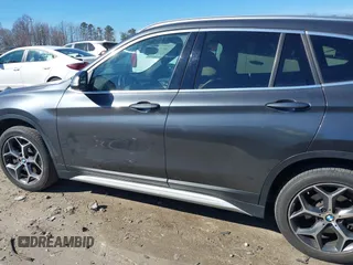 2018 BMW X1 xDrive28i z VIN WBXHT3C31J3H31737, wystawiony jako IAAI lot #41698670 z przebiegiem 68 017 mil mil oraz . Historia ofert i sprzedaży dostępna na DreamBid. Obrazek 15.