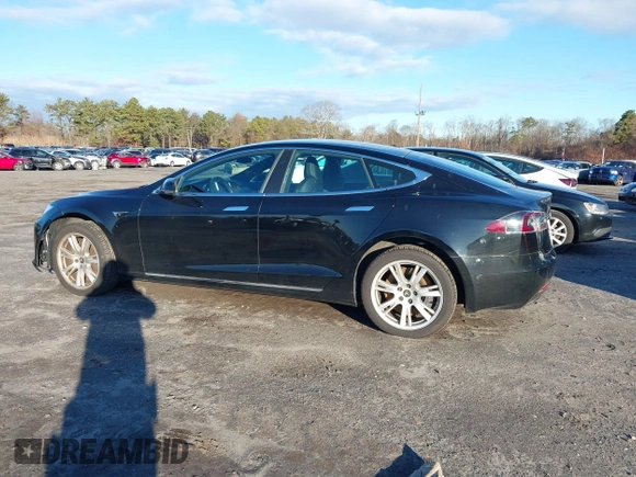 2020 Tesla Model S Long Range with VIN 5YJSA1E24LF413888, listed as a IAAI auction lot 41214903 with 42,711 mi miles and . Bid and sale history available at DreamBid. Image 14.
