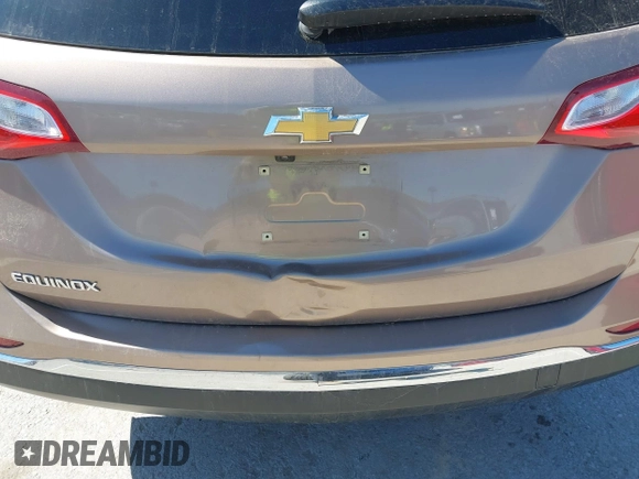 2018 Chevrolet Equinox LS with VIN 2GNAXHEV2J6160948, listed as a IAAI auction lot 41818156 with 152,457 mi miles and . Bid and sale history available at DreamBid. Image 17.