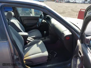 1996 Toyota Camry DX with VIN 4T1BG12KXTU655820, listed as a IAAI auction lot 42093458 with 197,247 mi miles. Bid and sale history available at carsss.com. Image 5.