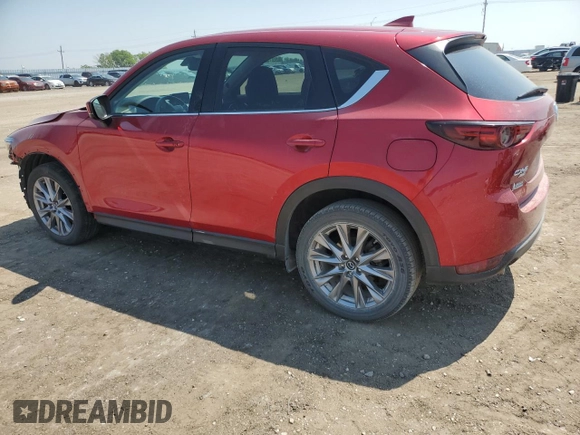 2019 Mazda CX-5 Grand Touring with VIN JM3KFBDM7K1668396, listed as a Copart auction lot 59732785 with 23,855 mi miles and Salvage title. Bid and sale history available at DreamBid. Image 2.