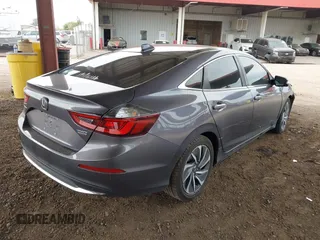 2020 Honda Insight Touring with VIN 19XZE4F94LE007115, listed as a IAAI auction lot 41819370 with 53,774 mi miles and . Bid and sale history available at carsss.com. Image 4.
