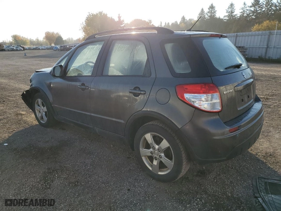2011 Suzuki SX4 Hatchback JX with VIN JS2YA5A29B6300087, listed as a Copart auction lot 76692734 with 262,599 mi miles and Salvage Title. Bid and sale history available at carsss.com. Image 2.