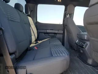 2023 Ford F-150 XL with VIN 1FTFW1E55PKD59670, listed as a Copart auction lot 48297005 with 20,668 mi miles and Salvage Title. Bid and sale history available at carsss.com. Image 10.